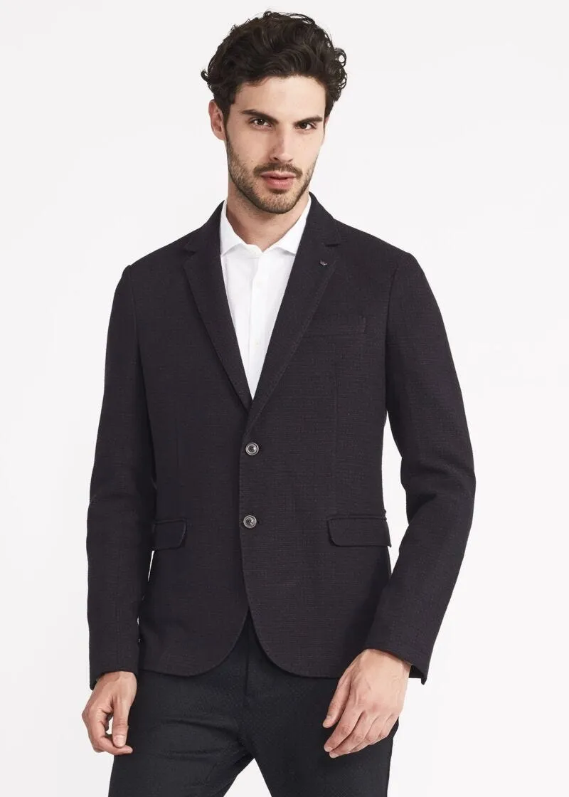 Cotton reinforced single-breasted jacket.