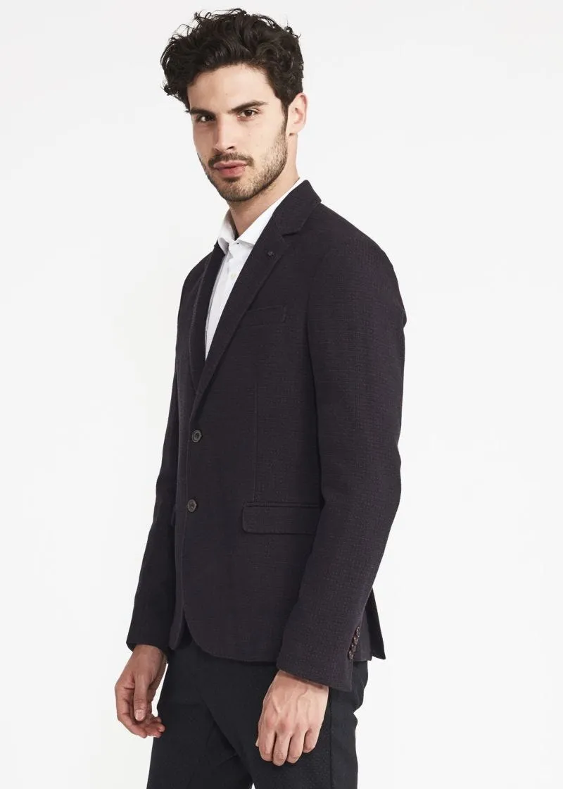 Cotton reinforced single-breasted jacket.