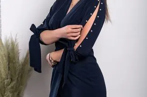 Dark blue Candys mini dress with faux pearl detailing and wrap neckline.