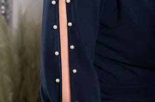 Dark blue Candys mini dress with faux pearl detailing and wrap neckline.