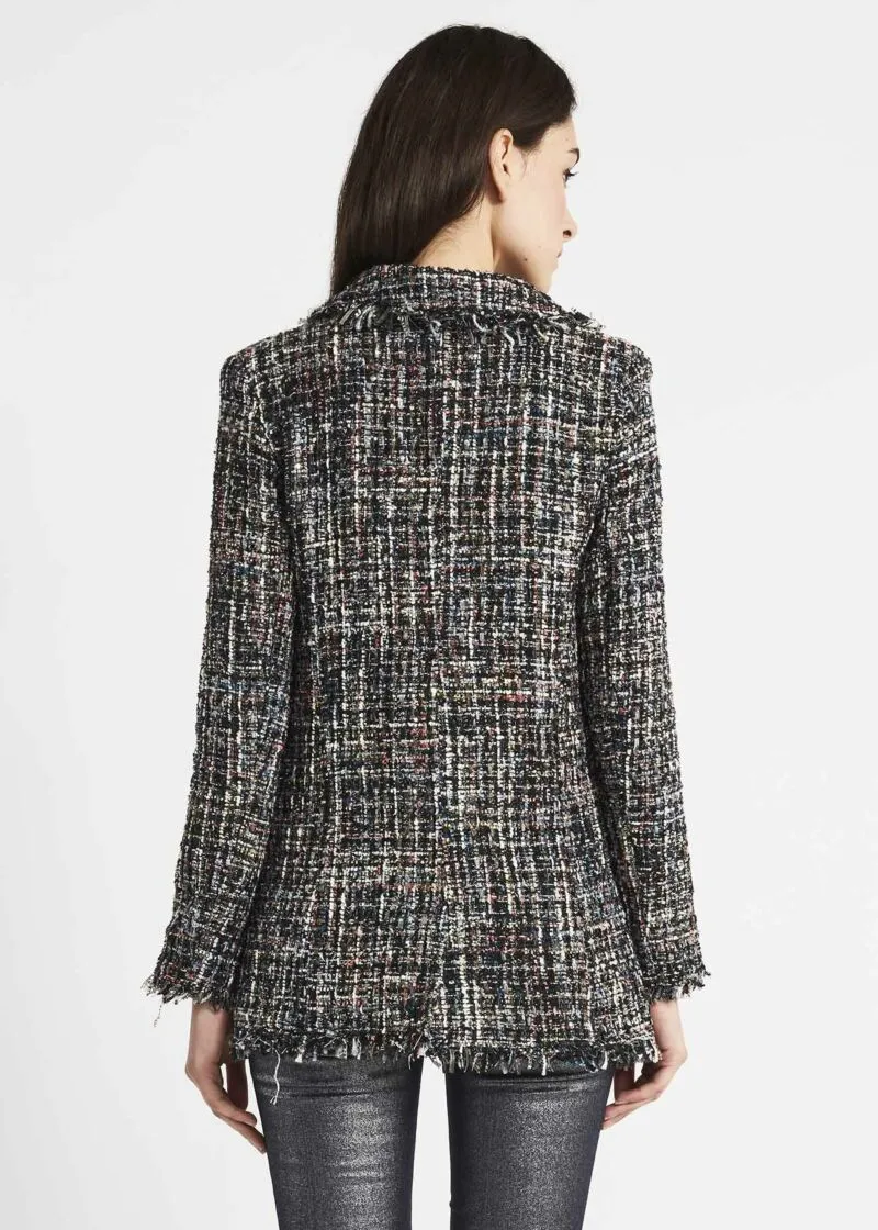 Double-breasted jacket with fringed edges.