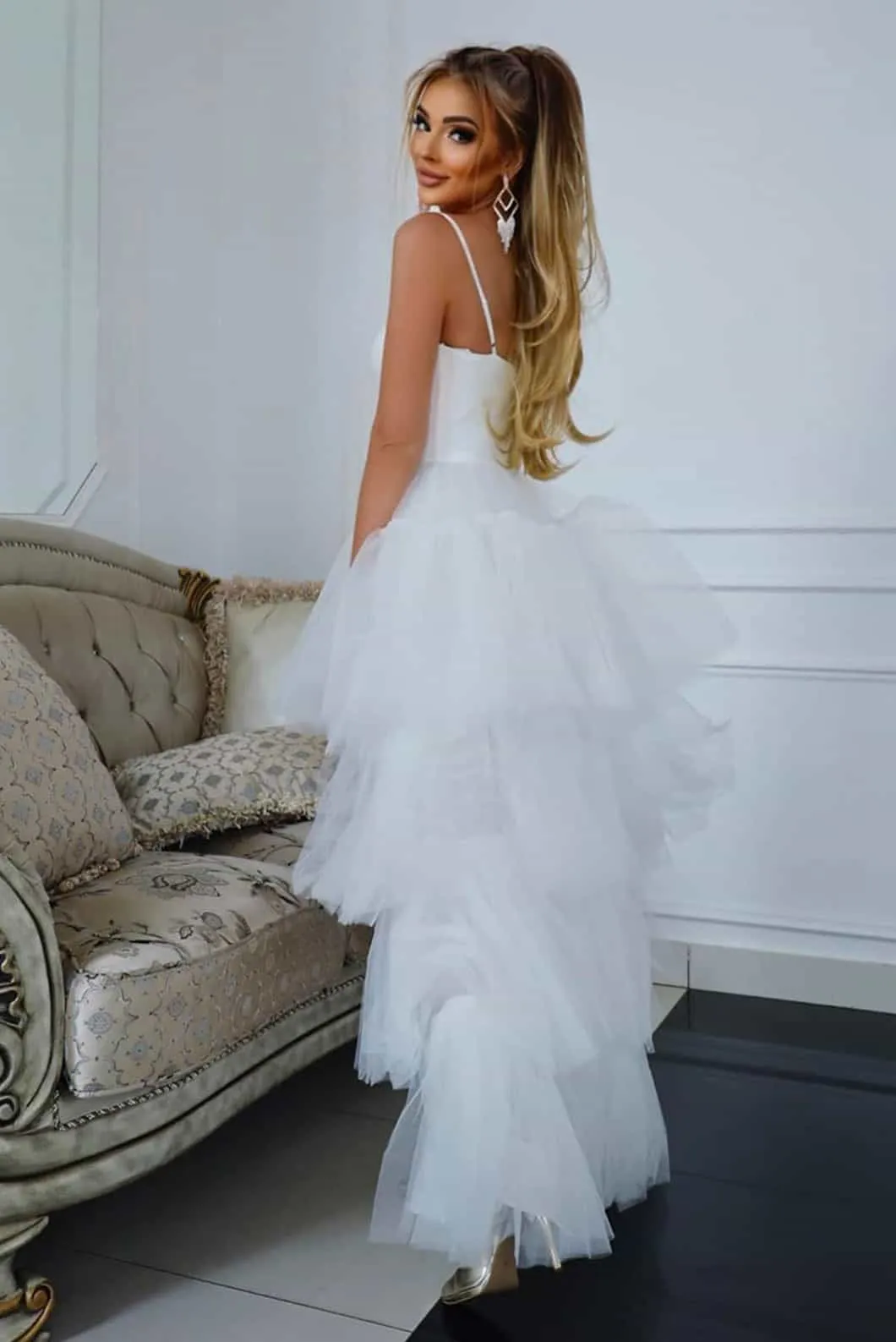 Elegant asymmetrical tulle dress.