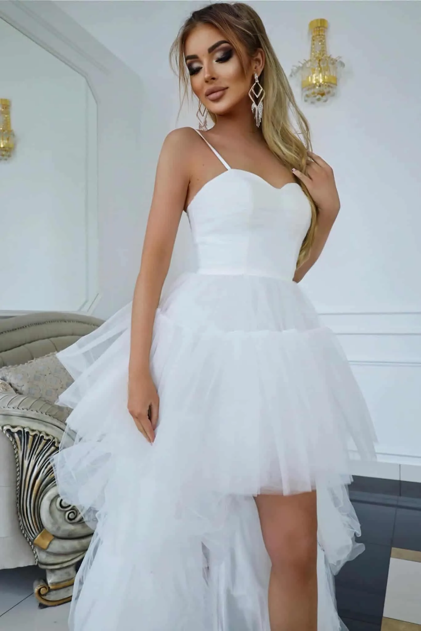 Elegant asymmetrical tulle dress.