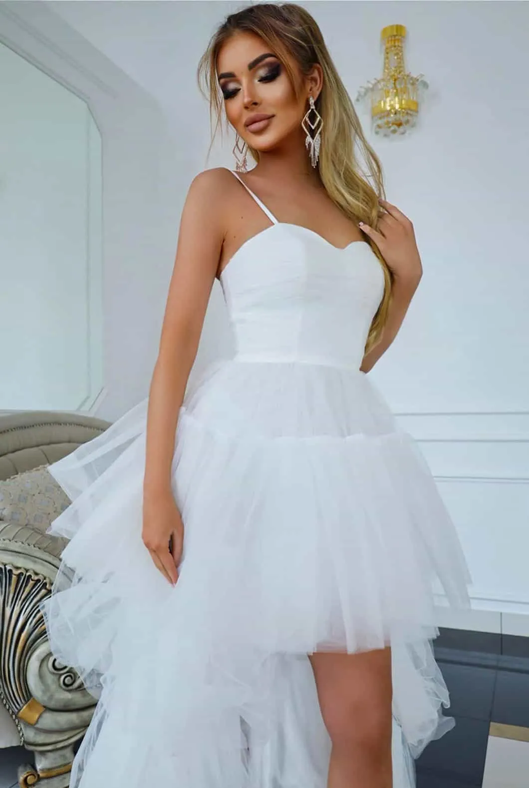Elegant asymmetrical tulle dress.