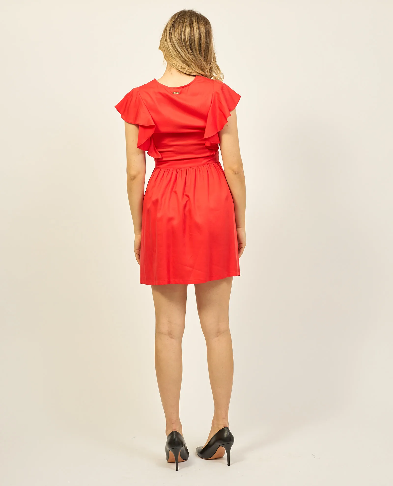 Gaudi short dress with V neckline and ruffle.