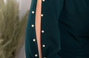 green mini dress with faux pearl detail and cross neckline with Candys
