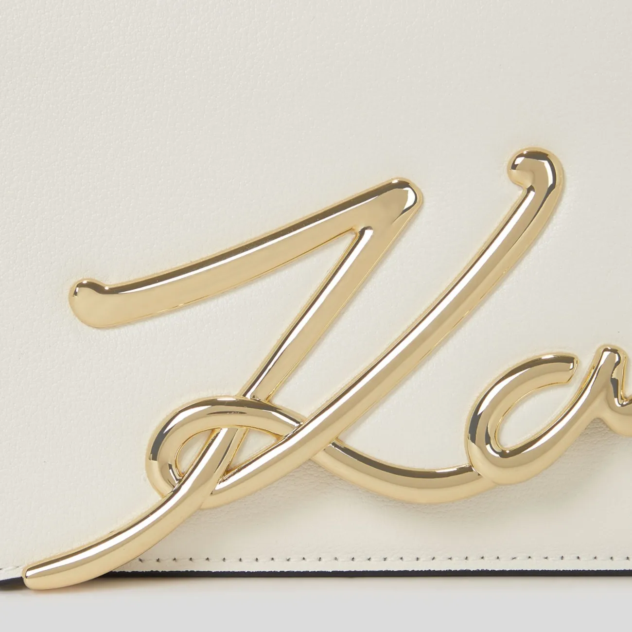 Karl Lagerfeld white signature shoulder bag.