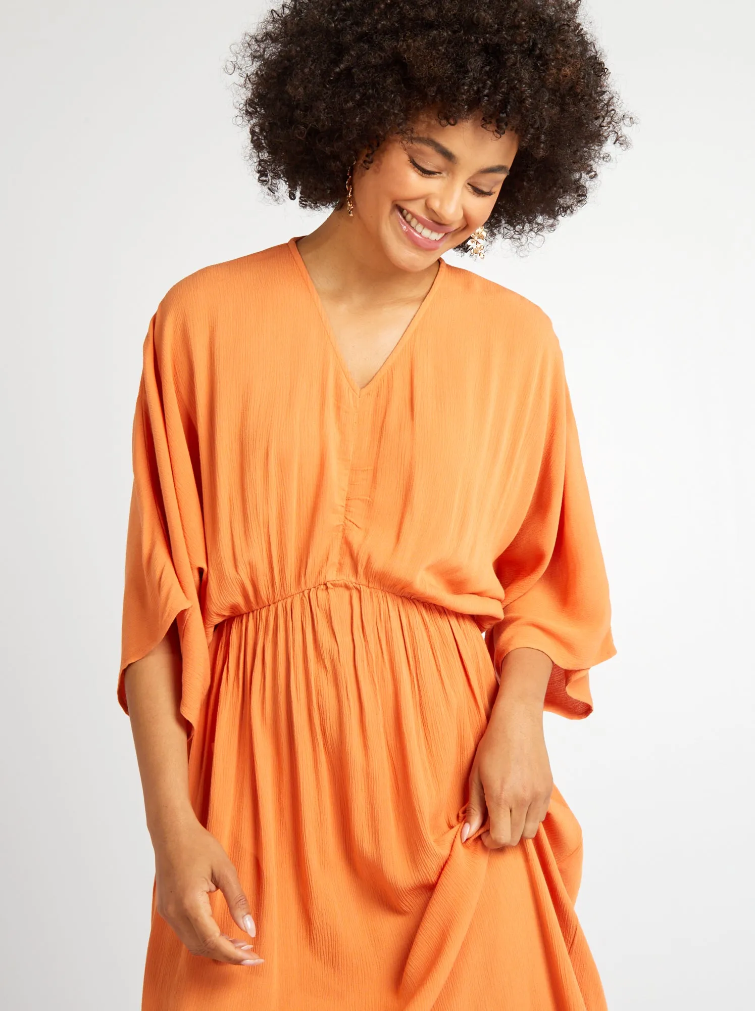 Long orange dress with batwing sleeves - result