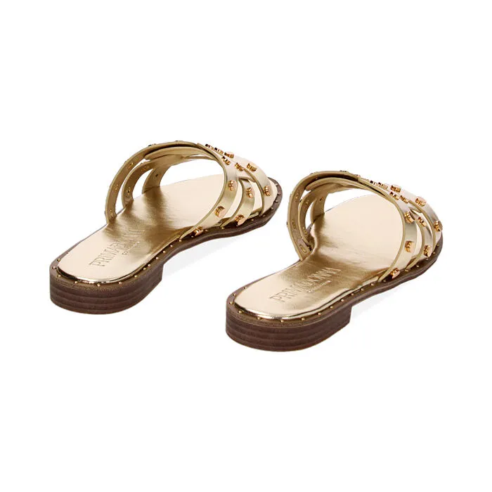 Low gold laminated sandals with studs