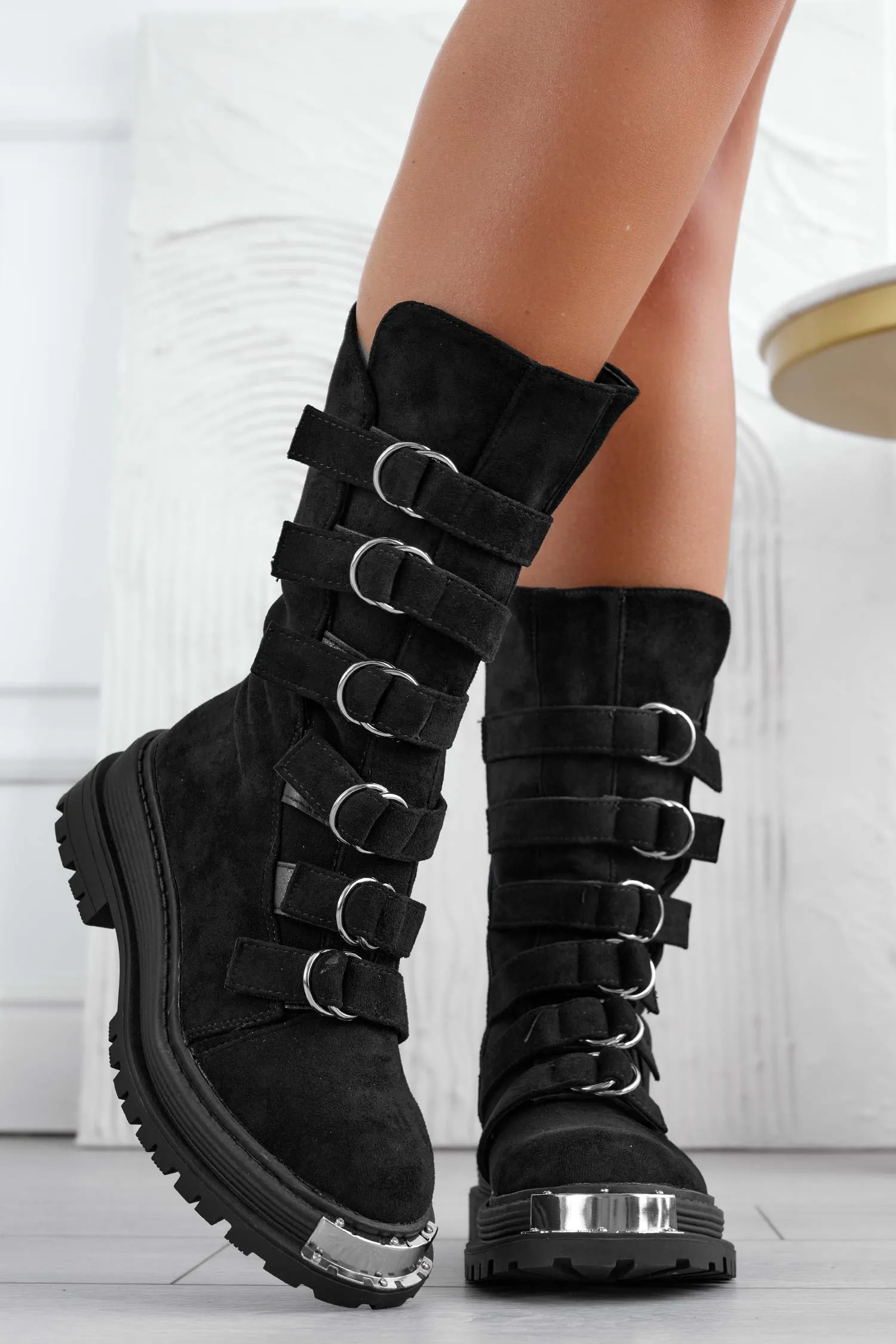 Monica - Black ankle boots with buckles and silver plate.
