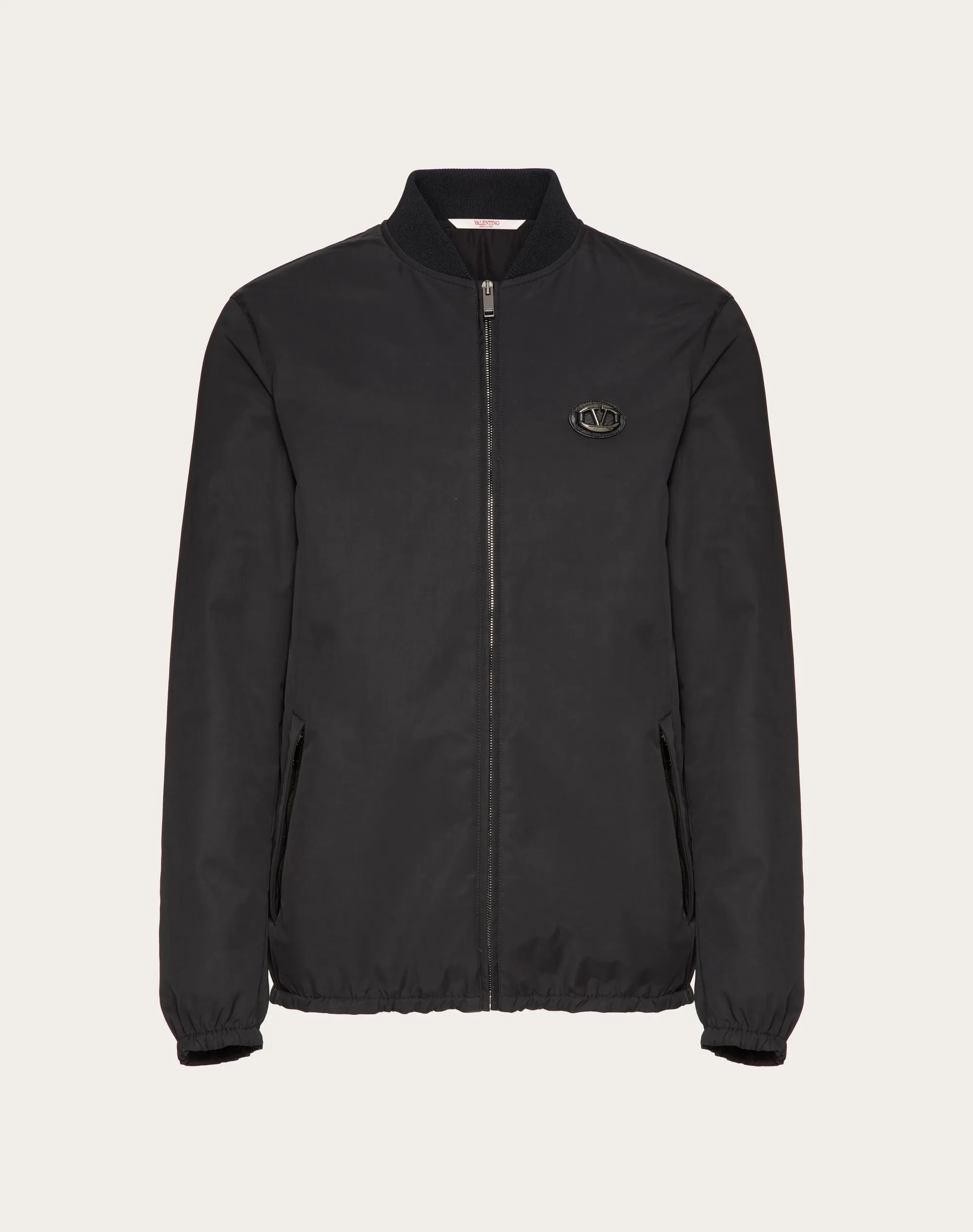 Nylon jacket with leather patches and signature V-logo.
