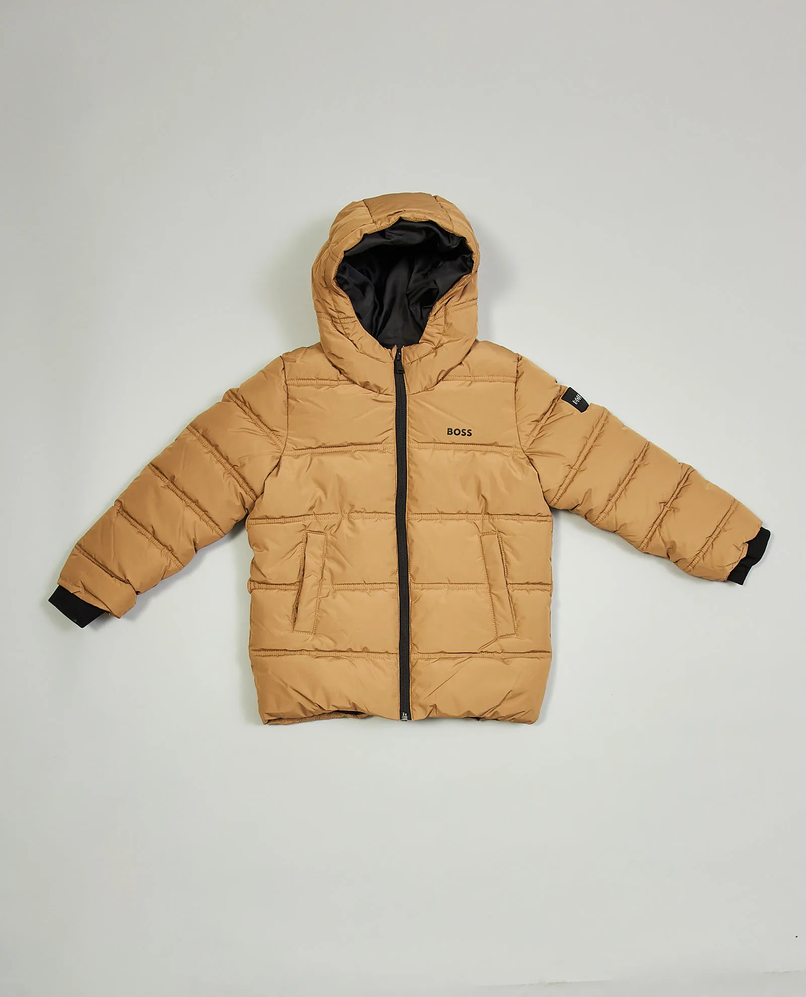 Reversible and water repellent Boss children's down jacket.