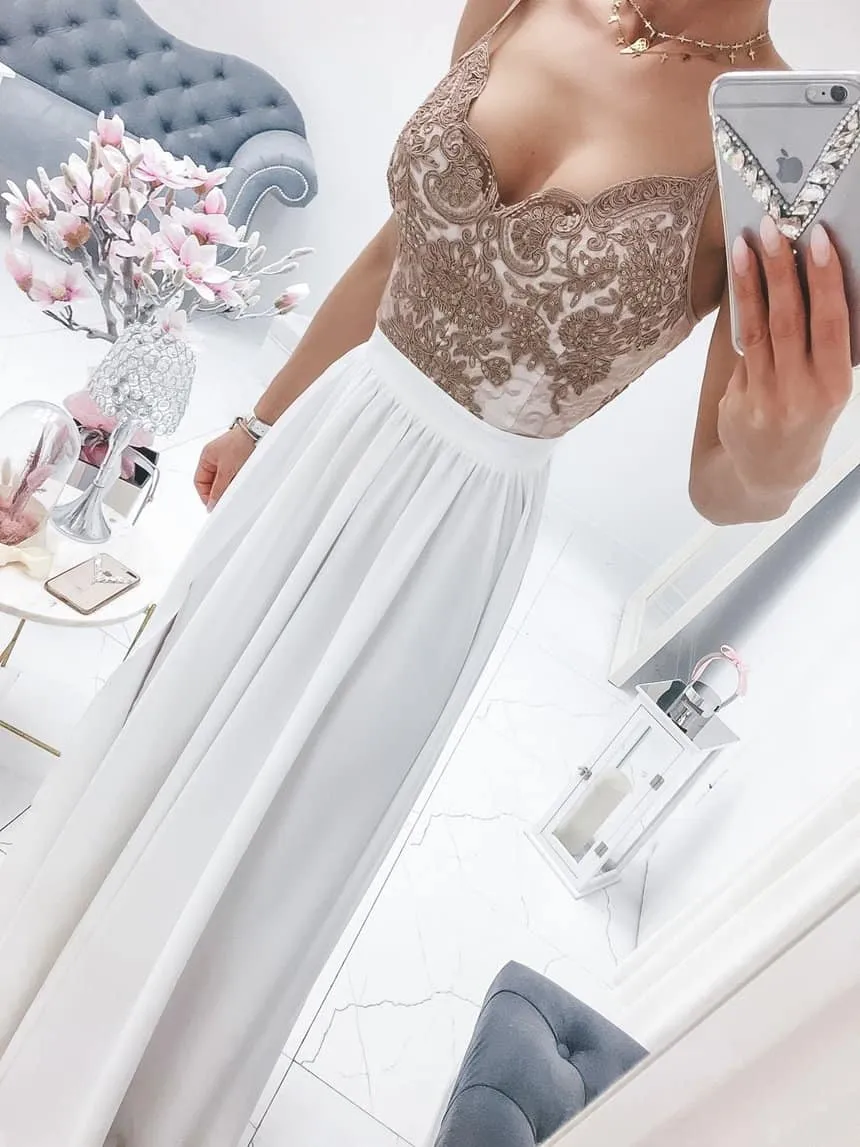 White lightweight fabric elegant ceremony dress.